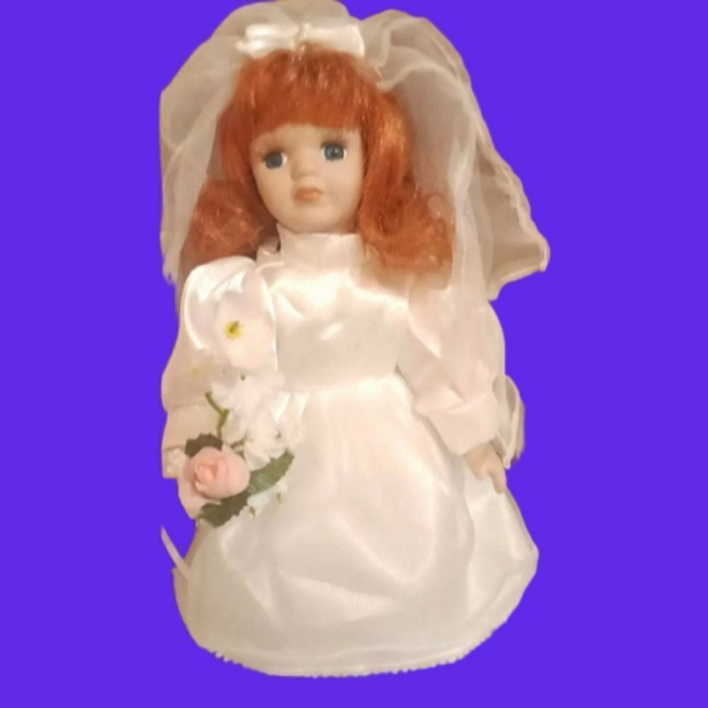 Vintage 8" Bride Porcelain Doll. Red Hair. Complete with boquet